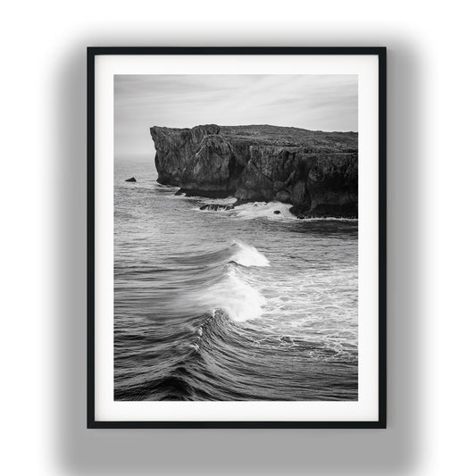 Coastal Cliff and Rolling Waves